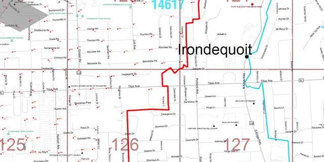 A street-level custom map of Irondequoit, New York, with numbered grid squares and a boundary drawn in red.
