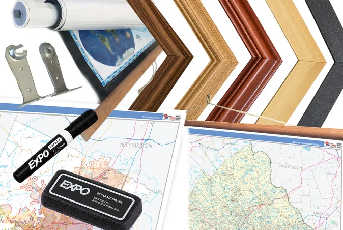 Finishing samples: wood frame corners in several stains, hanging rails, a rolled map, and a laminated map with a dry-erase marker and eraser.