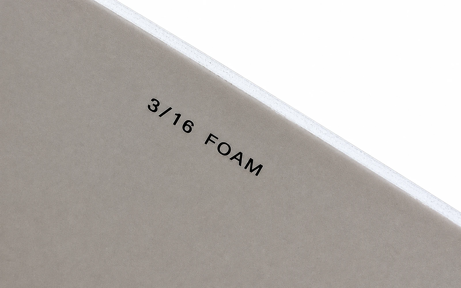 The cut corner of a board printed 3/16 FOAM