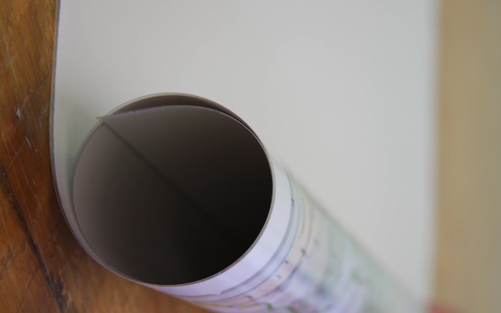 A laminated map rolled into a shipping tube