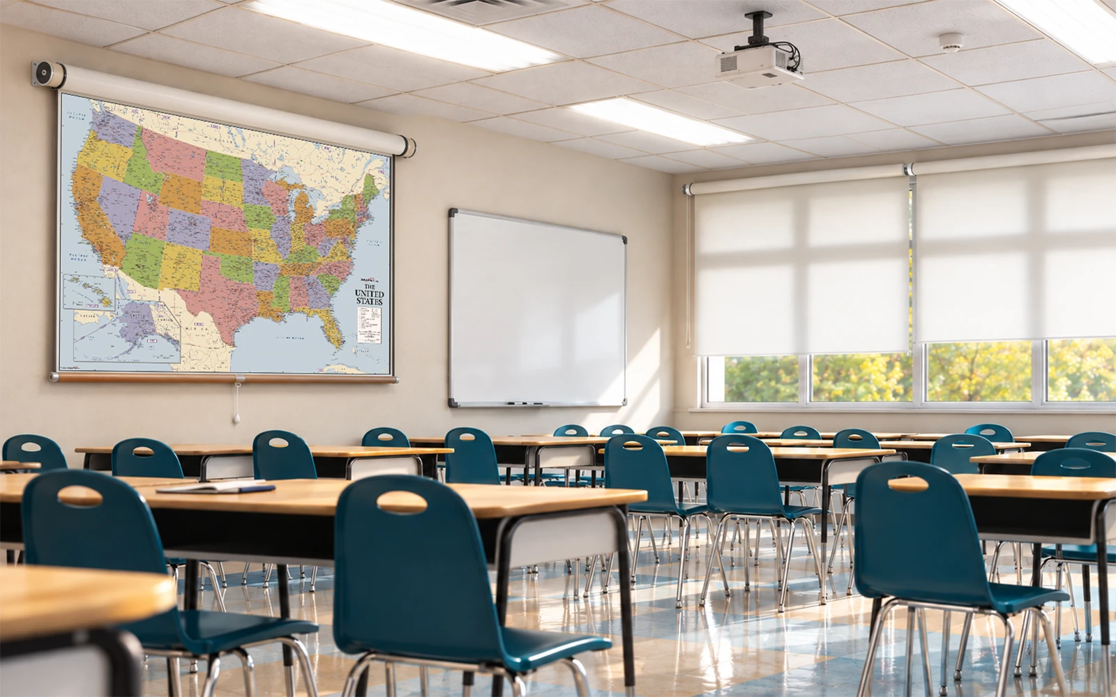 A classroom with a United States spring roller map pulled down